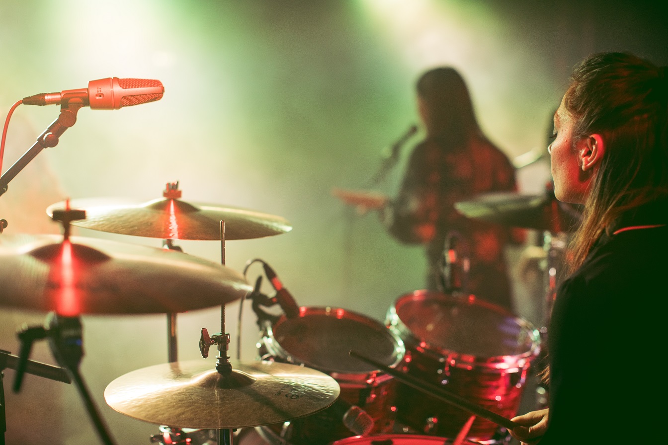 Student playing the drums