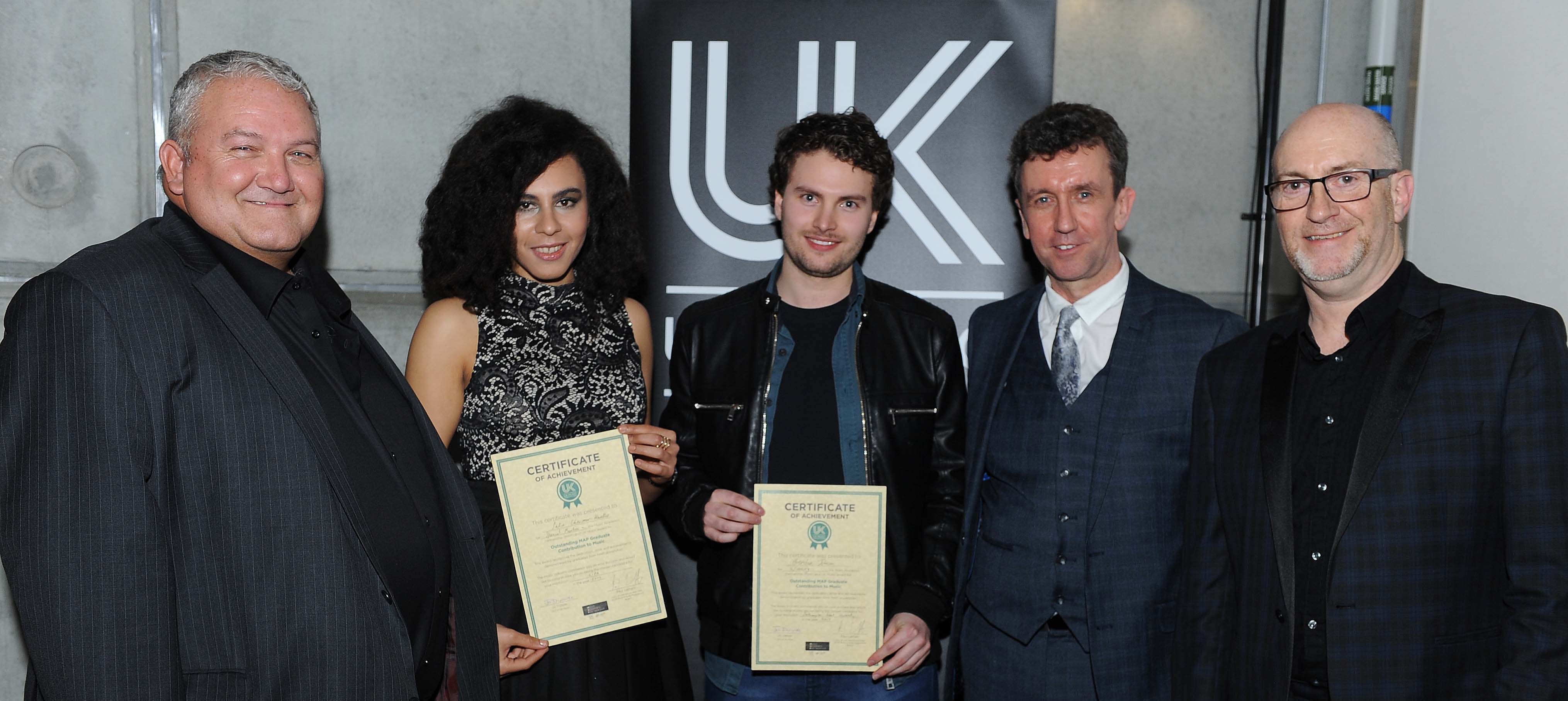 Brendan Johnson winning his award