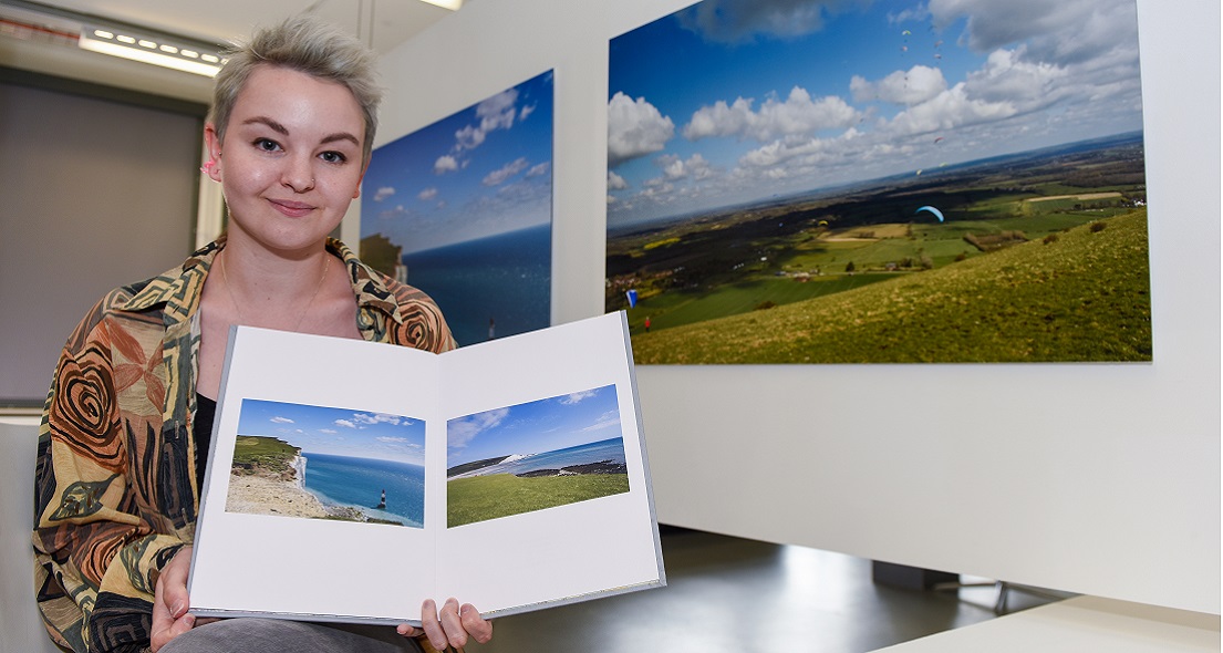 Charli Scally with her work