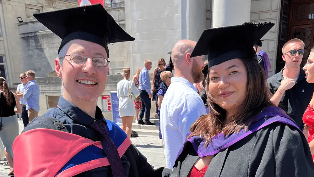 Adam Lewis with Andrea Dick during graduation