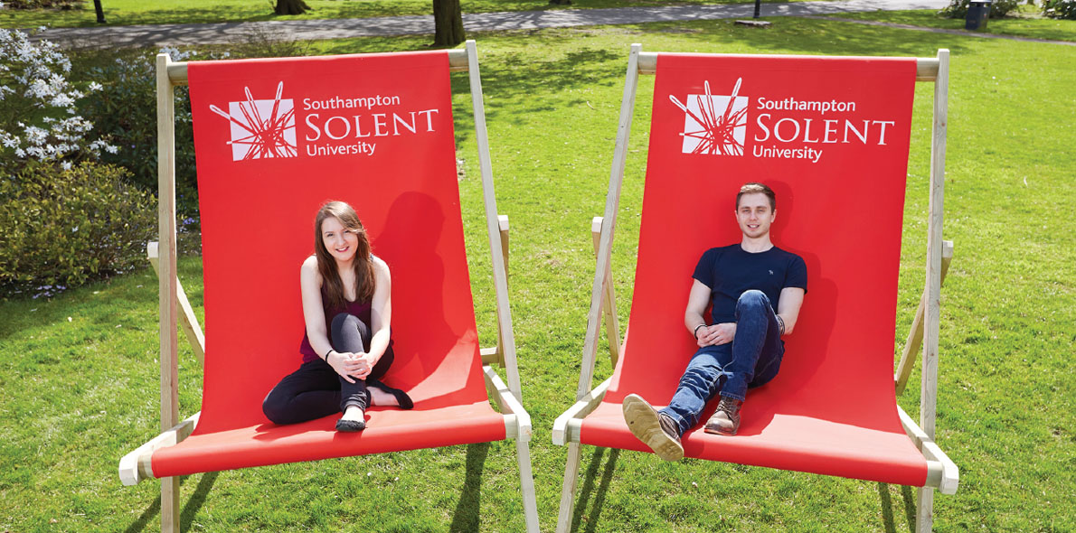 Students on big deck chairs