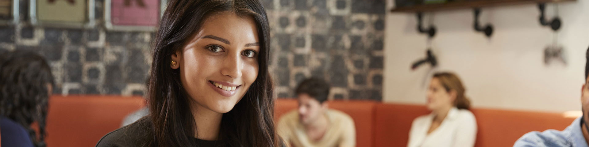 Female student in the East Park Deli at Solent University