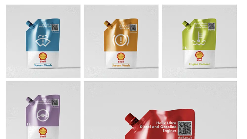 An image of five packages for car care products.
