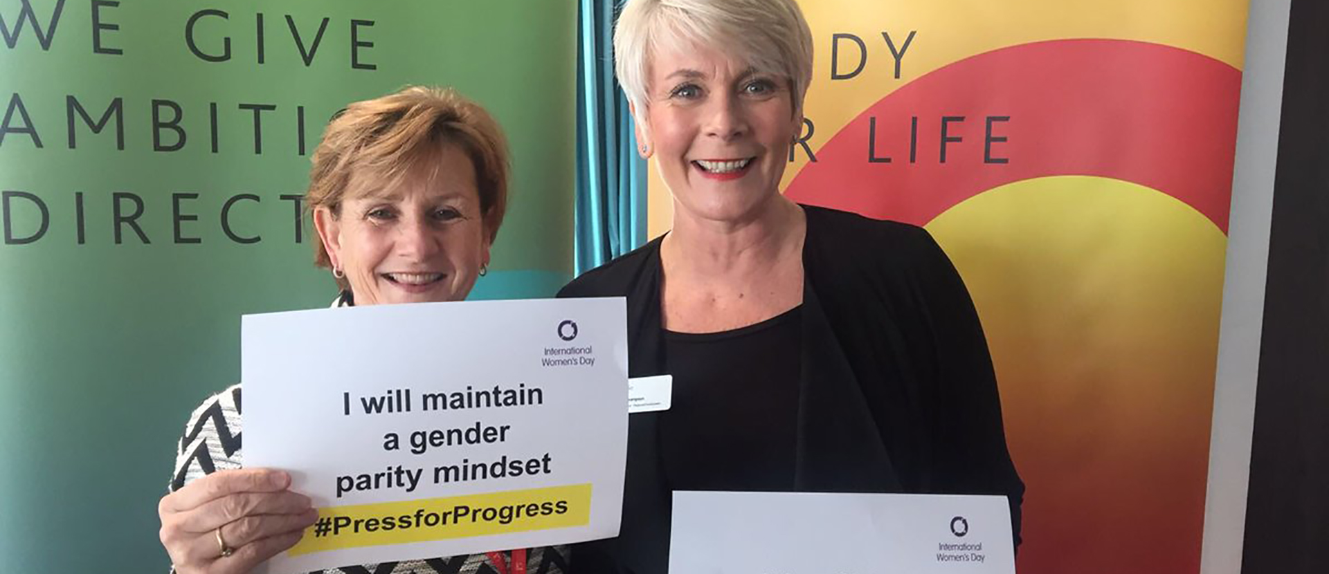 Two female Solent members of staff