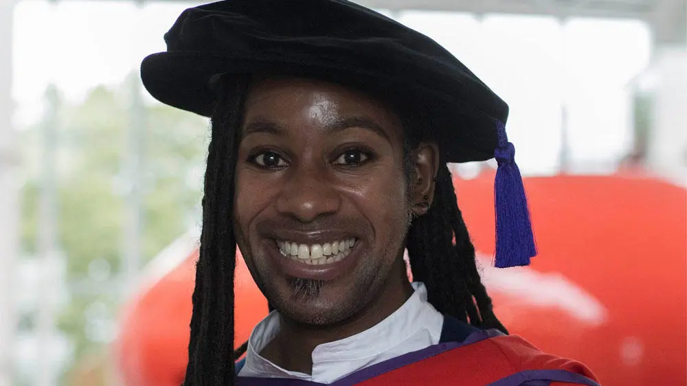 Professor Arday gowned up at the ceremony