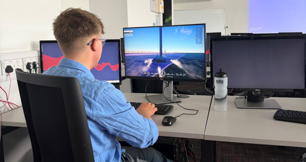 Leo sat at University computer operating simulator of vessel
