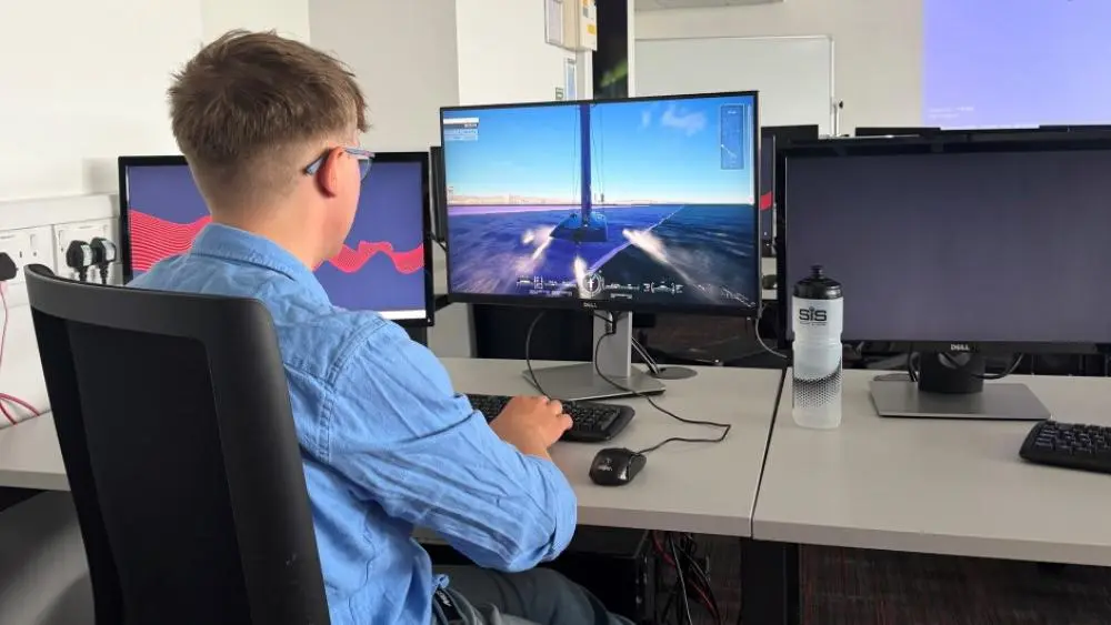 Leo sat at University computer operating simulator of vessel