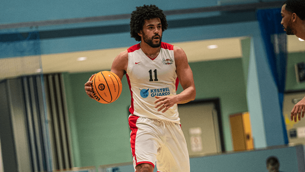 Luke Busumbru on the basketball court.