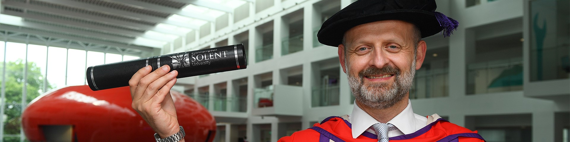 Mark Sanger with his honorary degree