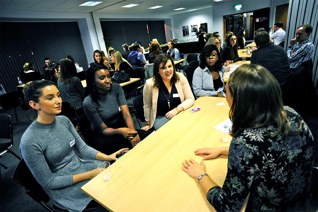PR students talking to industry experts