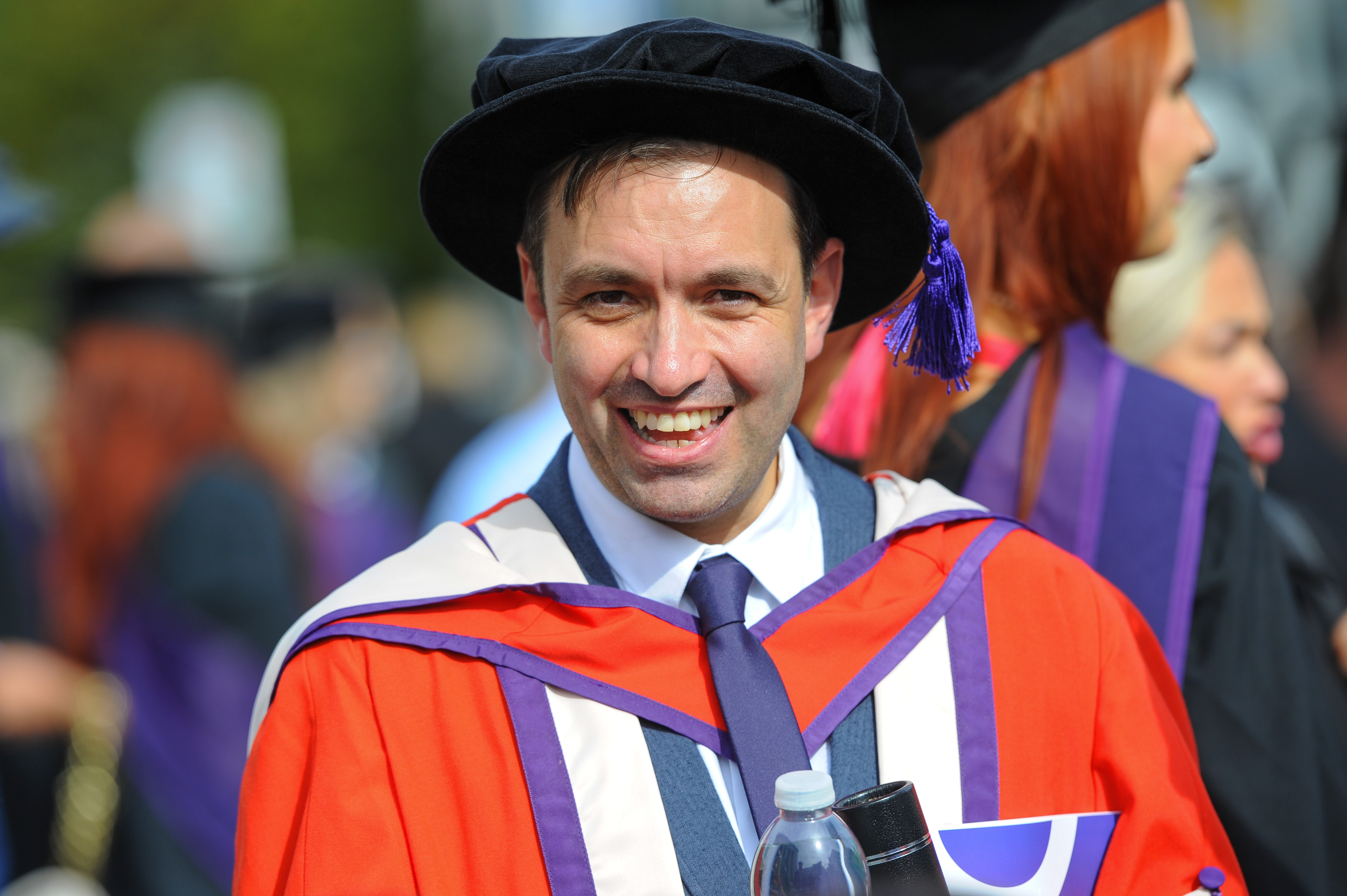 Michael Burton in Honorary Doctor of Arts Gown