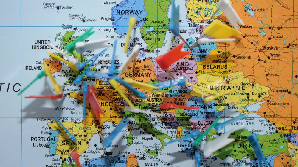 Flag with pins added showing the wide range of loactions Solent students have come from