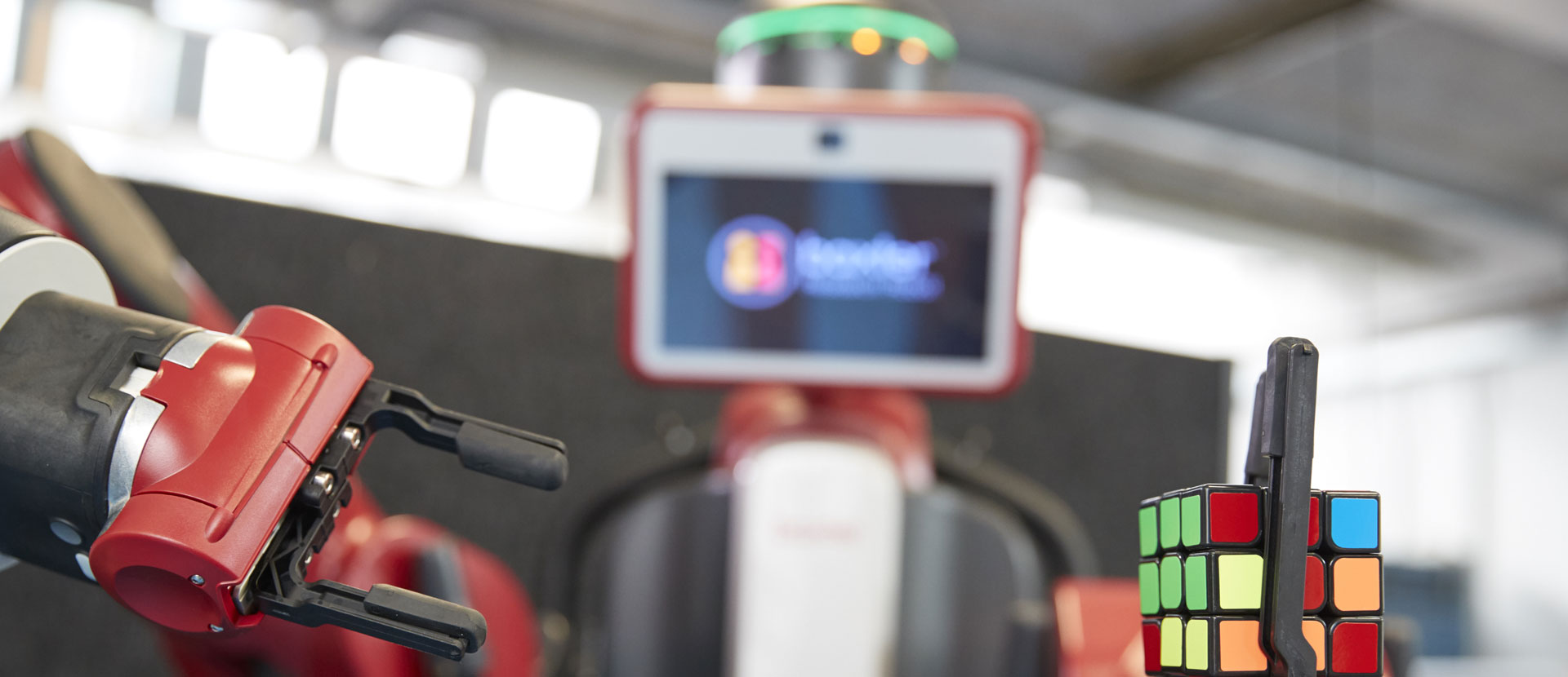 Baxter the robot holding a Rubiks cube