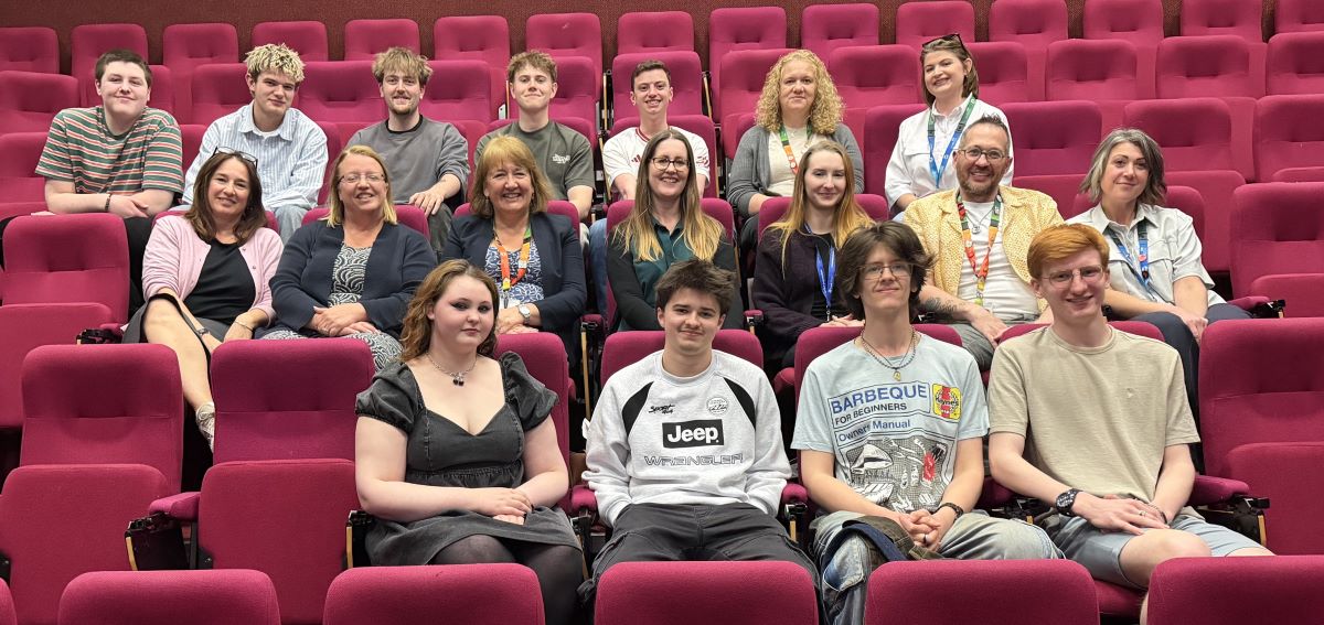 Students with staff and NHS representatives at the films screening