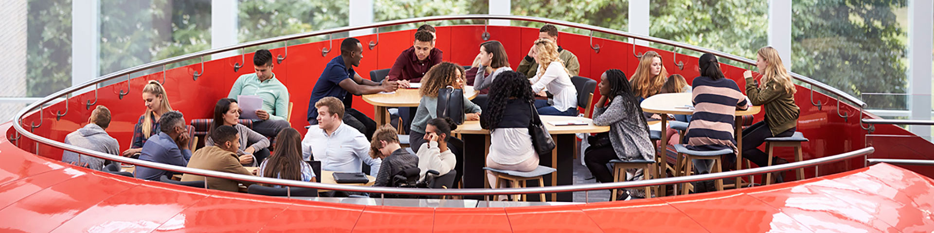 People sat around tables on top of the Pod