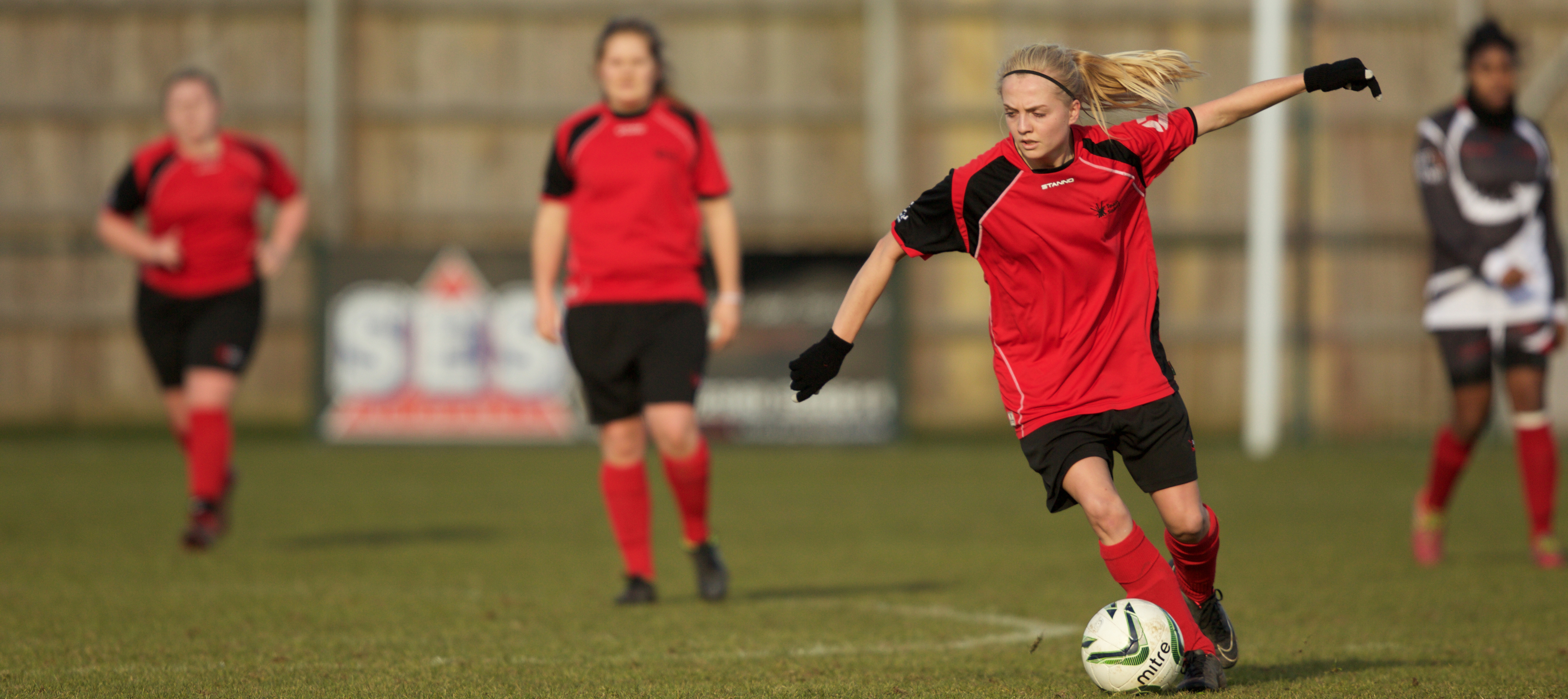 Tasha Kenny playing football