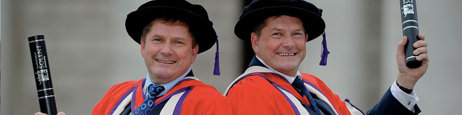 Pete and Pip Tyler with their honorary degrees from Solent University