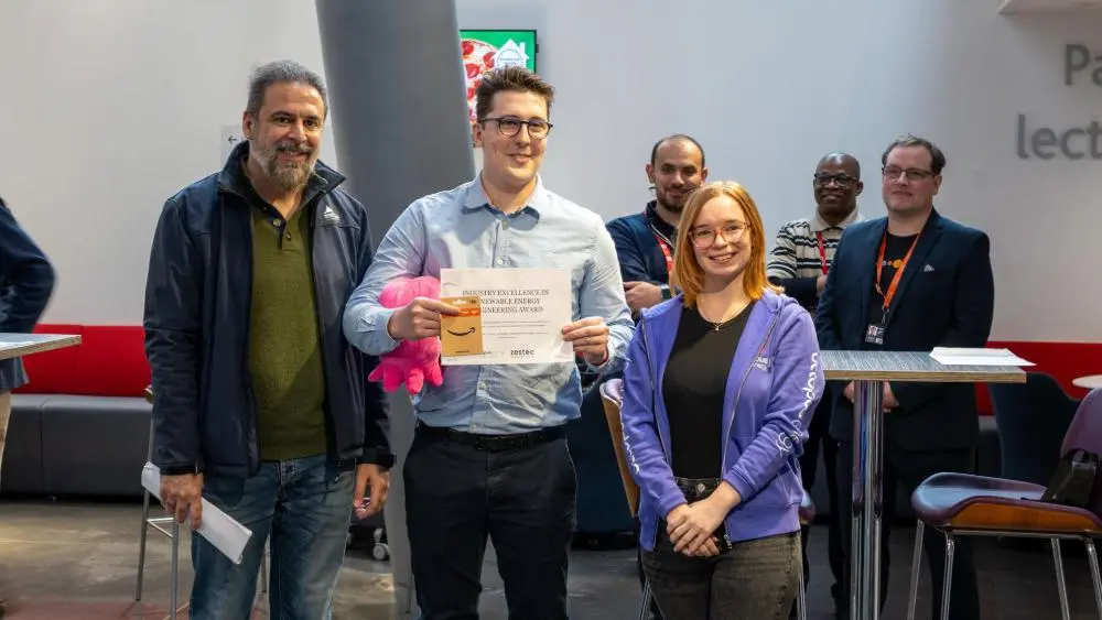 George accepting his industry award at the University's Engineering Poster Day