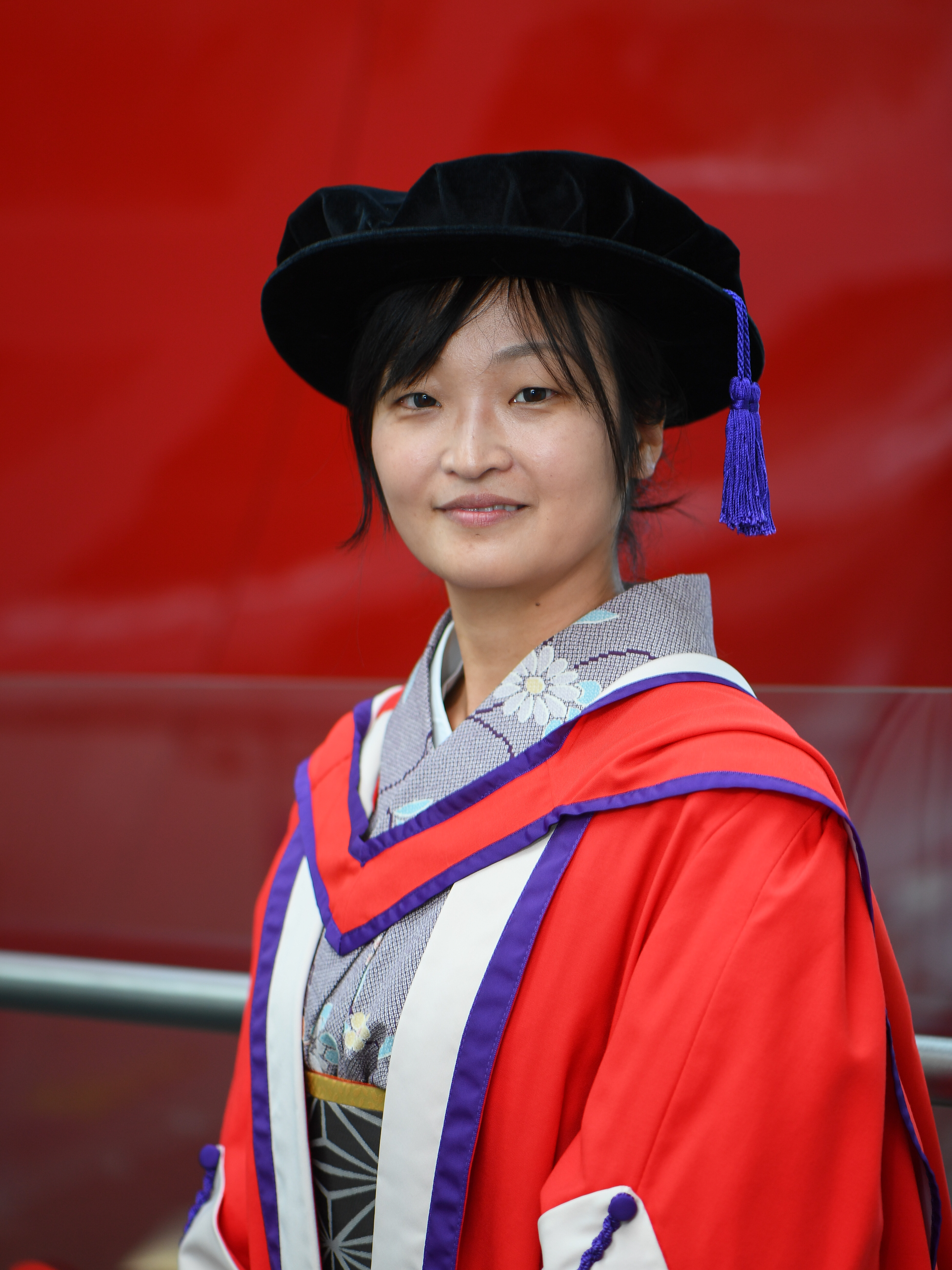 Image of Michiko Nitta in her Honorary Doctorate Gown