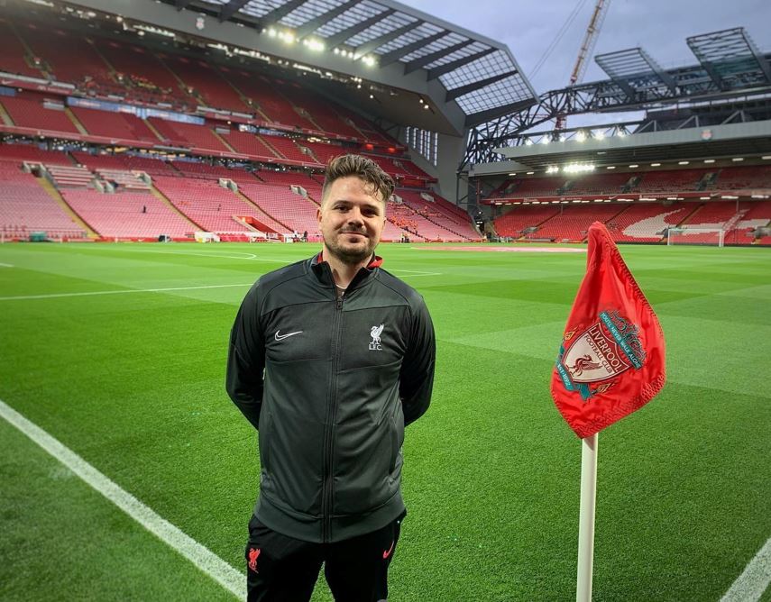 Jake Warner standing on Liverpool Football Club ground