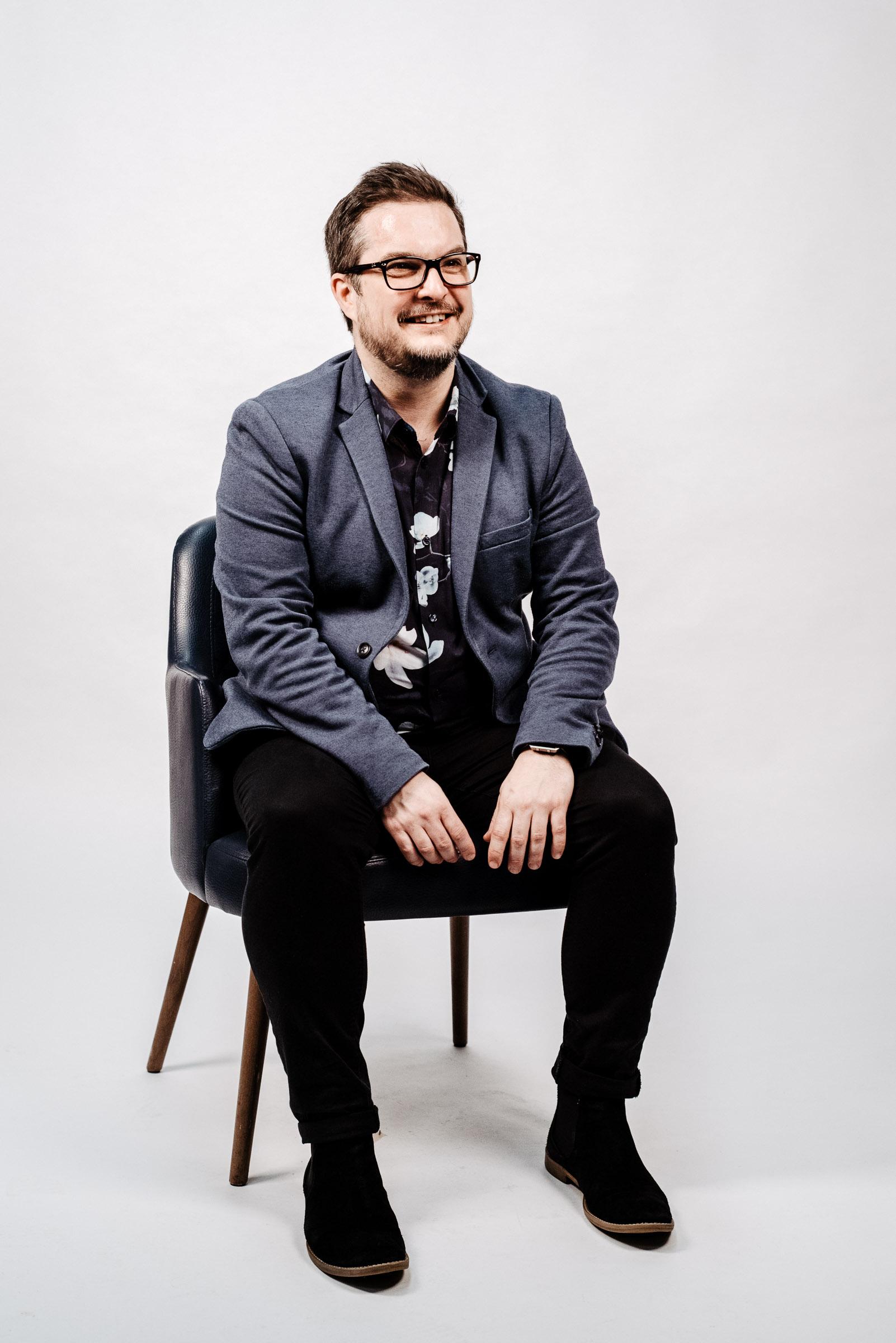 Image of Jim Irving sat on a chair