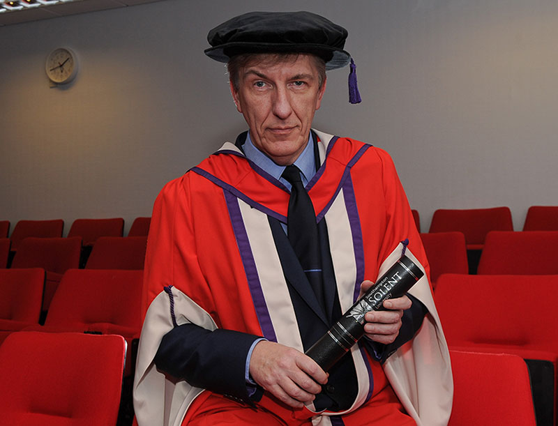 Mark Payton with his honorary degree from Solent University