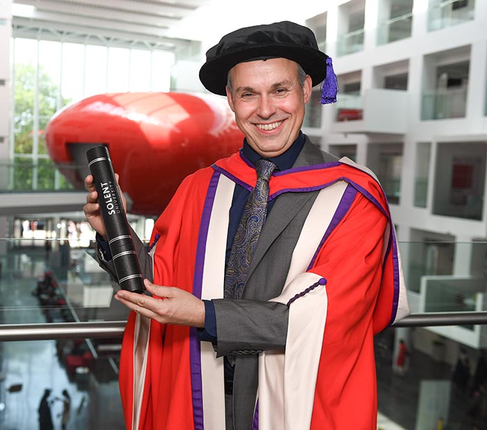 Paul Franklin with his degree in The Spark