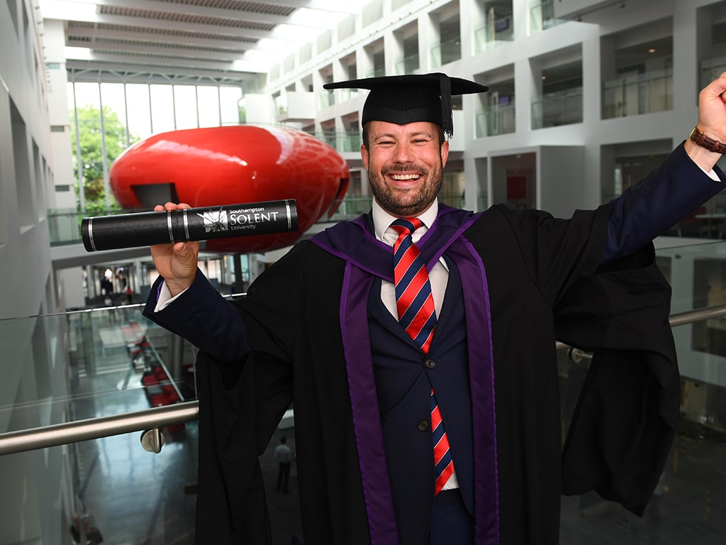 Richard Woods with his degree in The Spark