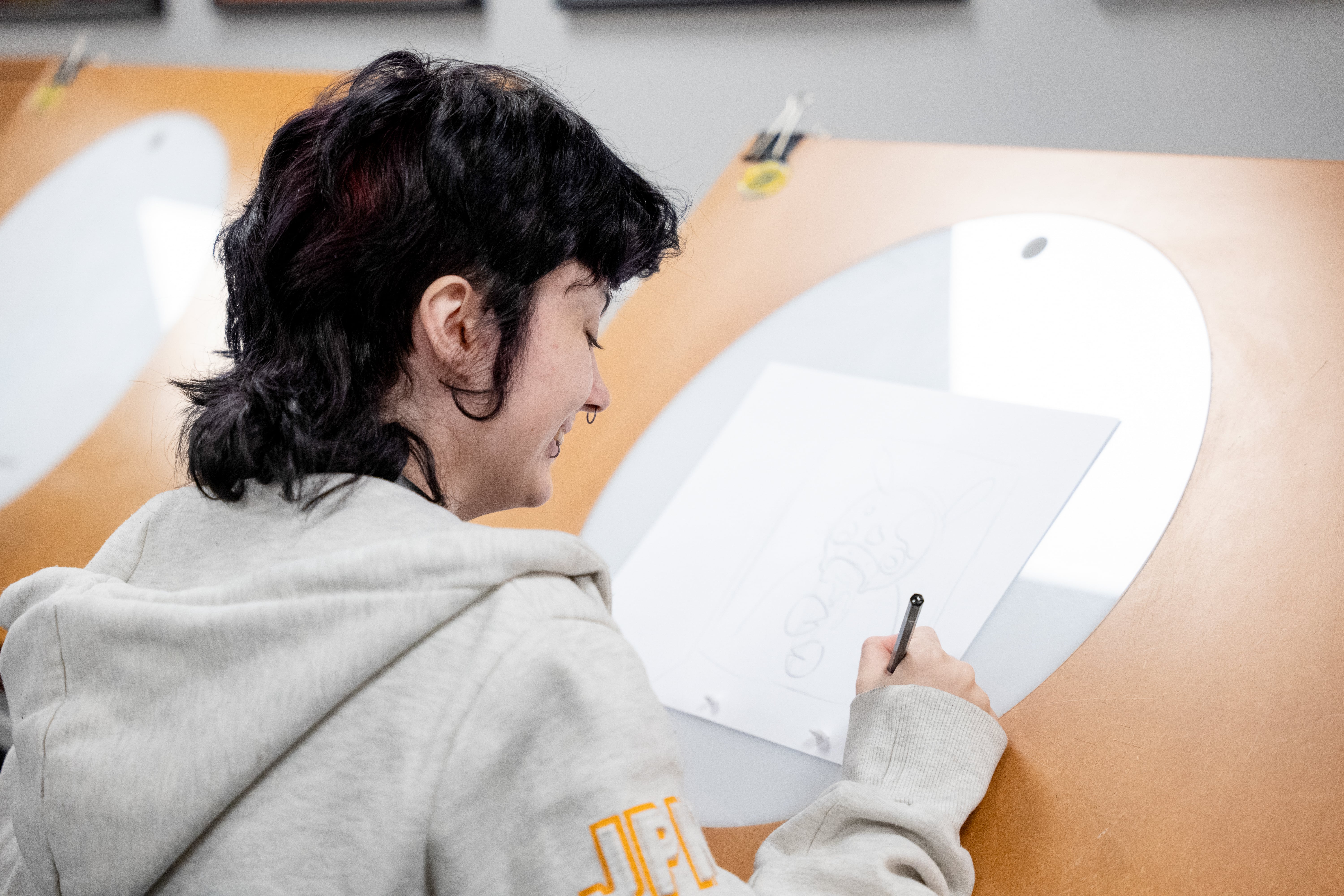 Student working at a lightbox