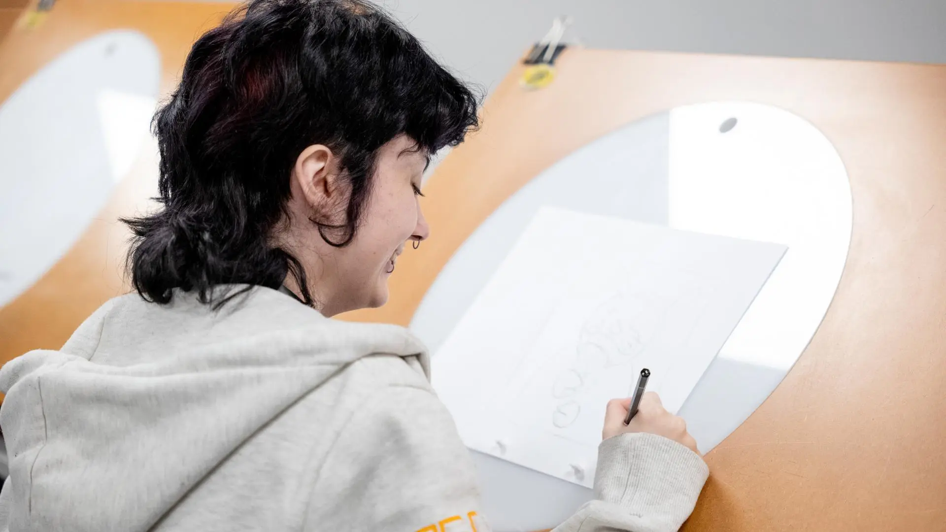 Student working at a lightbox