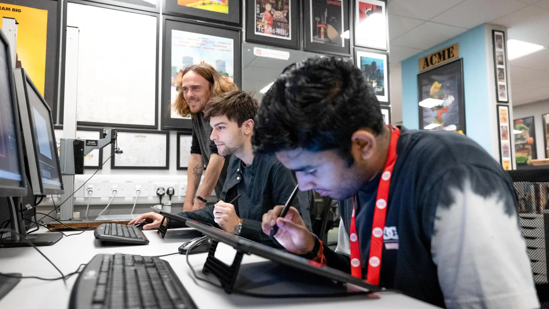 Student using graphics tablets to create animation