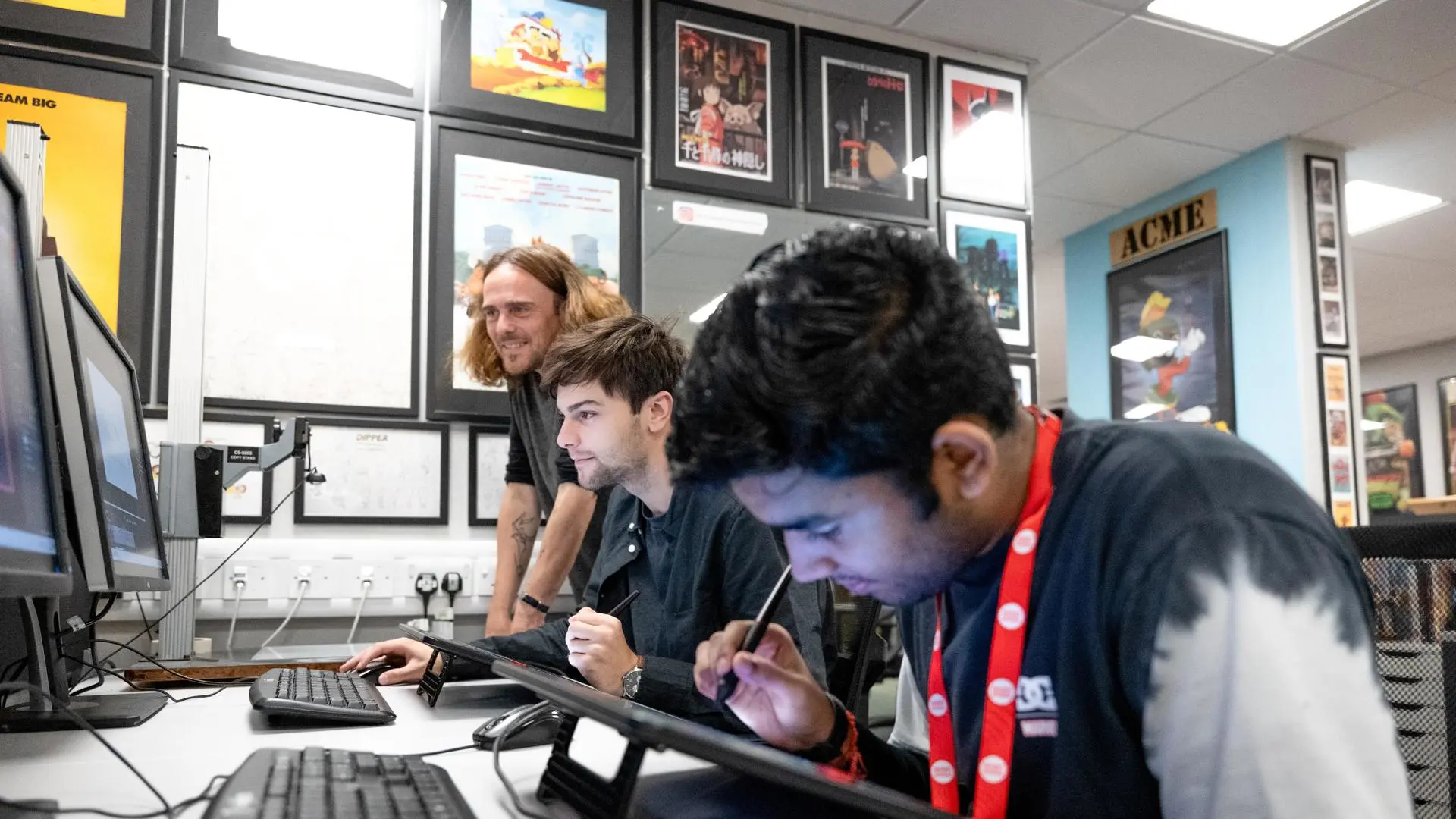 Student using graphics tablets to create animation