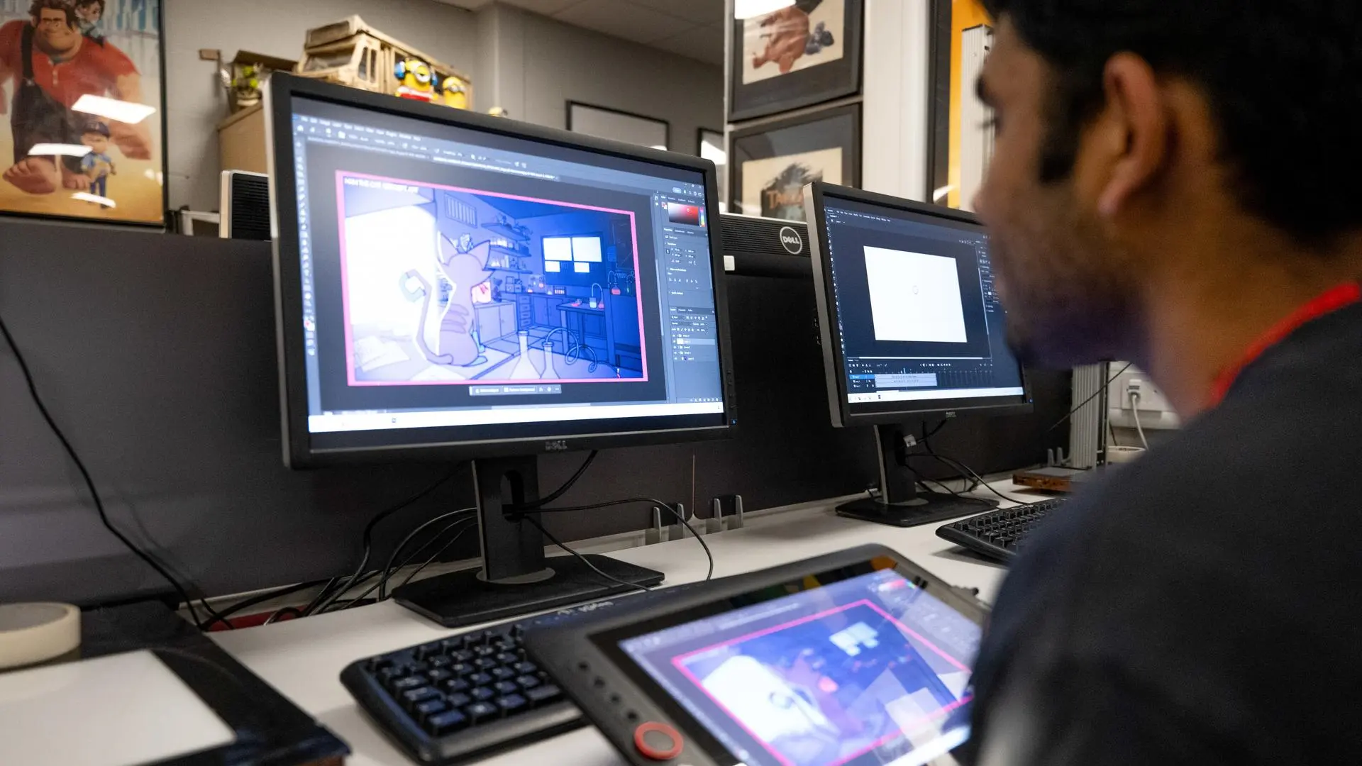 Student working on digital animation using a graphics tablet