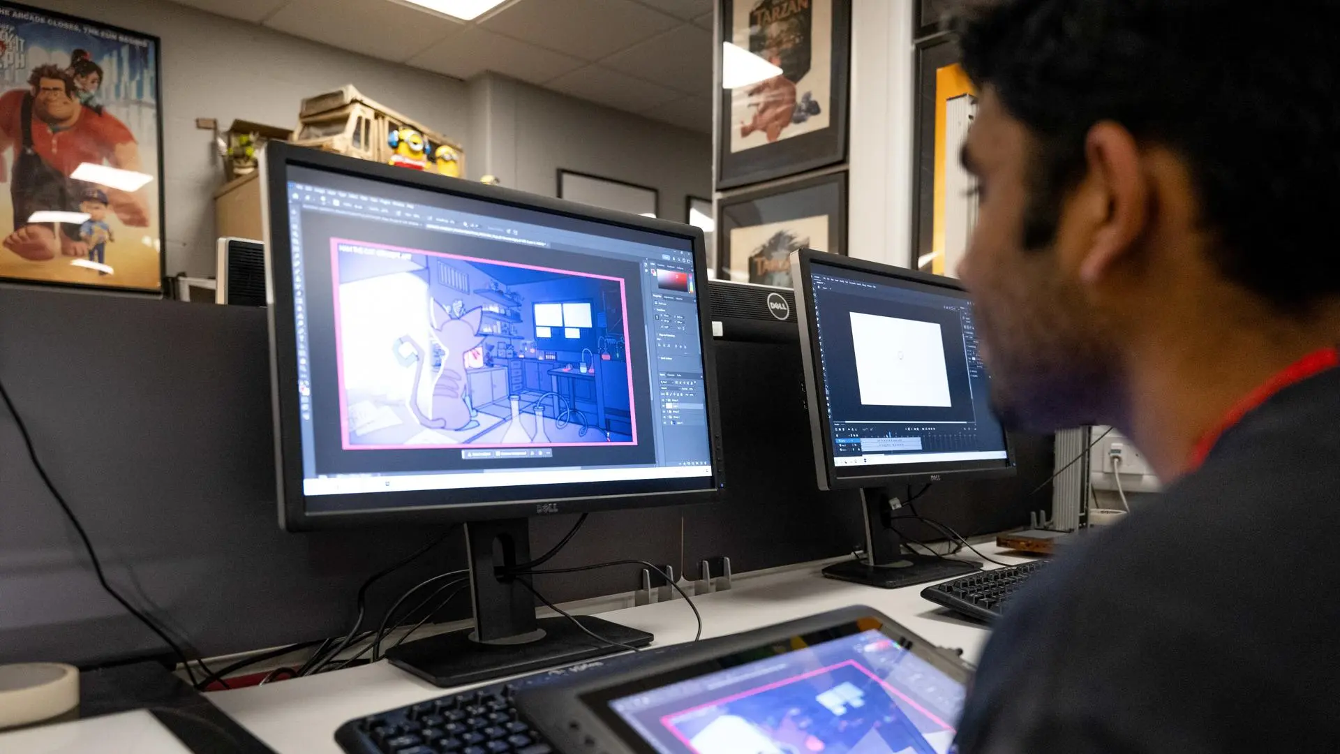 Student working on digital animation using a graphics tablet