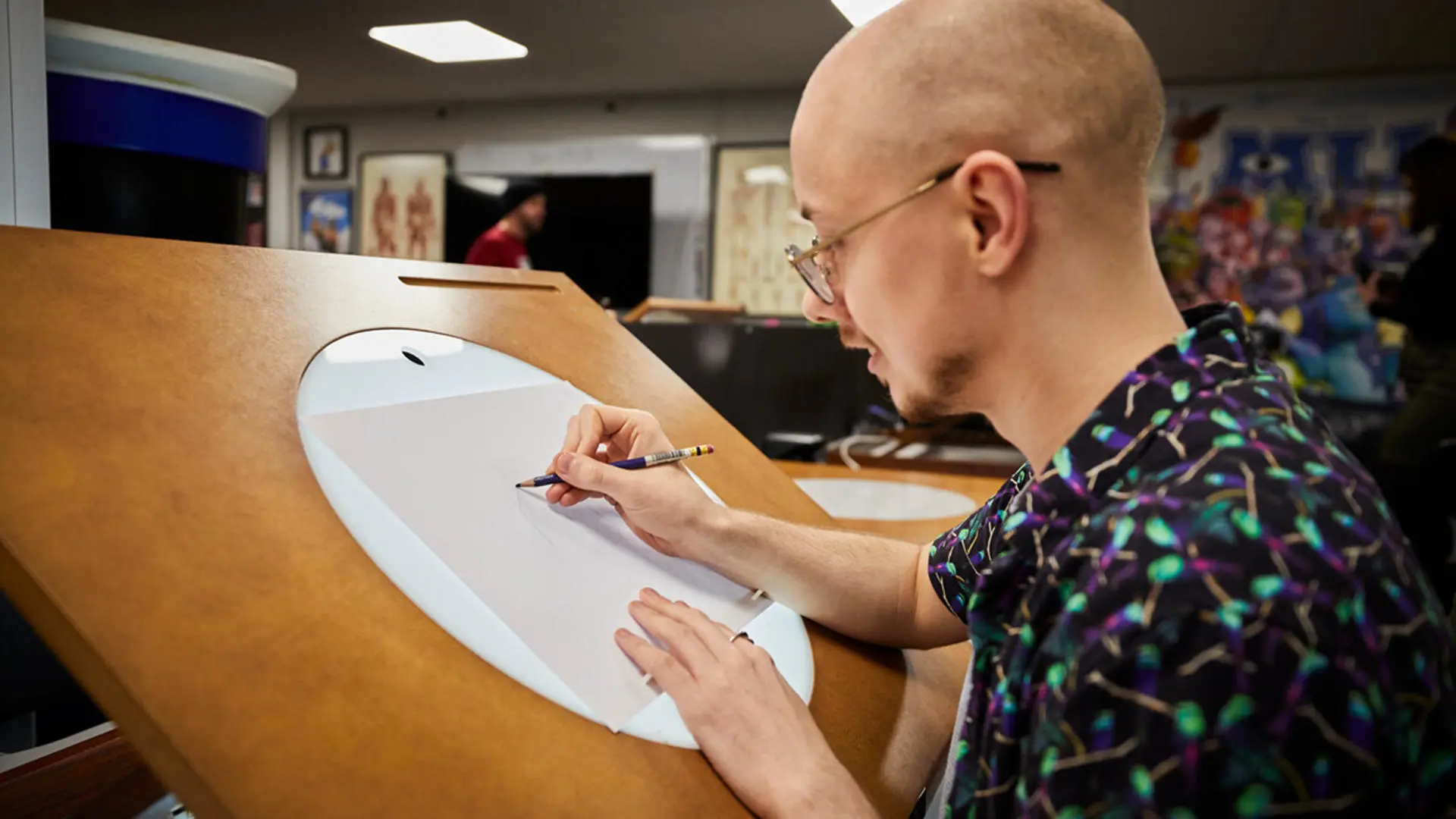 Animation student working at a lightbox