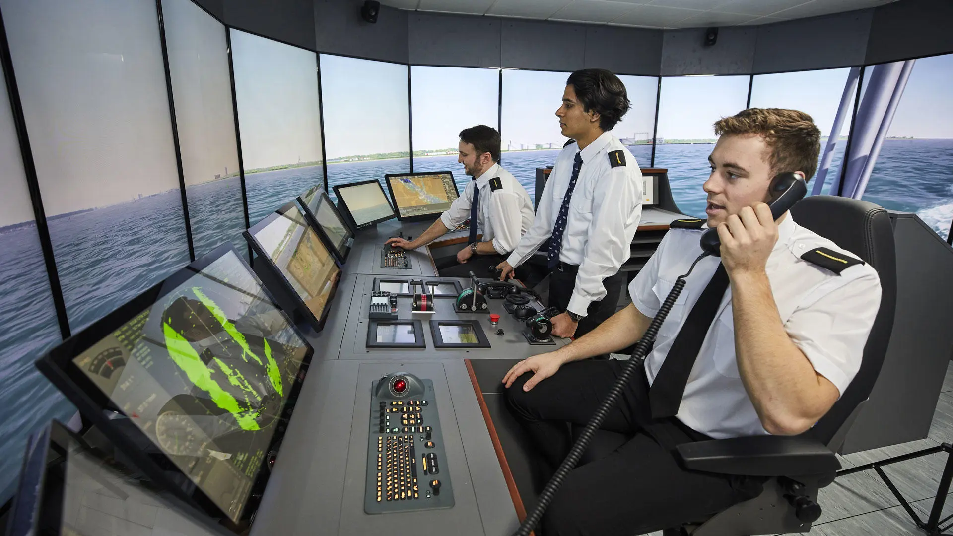 Deck cadets using the bridge simulator