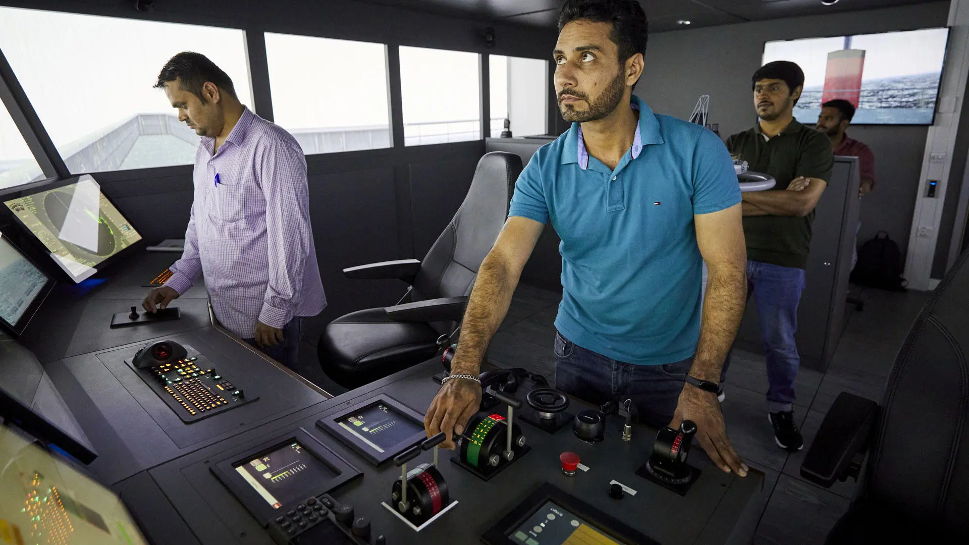 Officer of the watch students using the bridge simulator