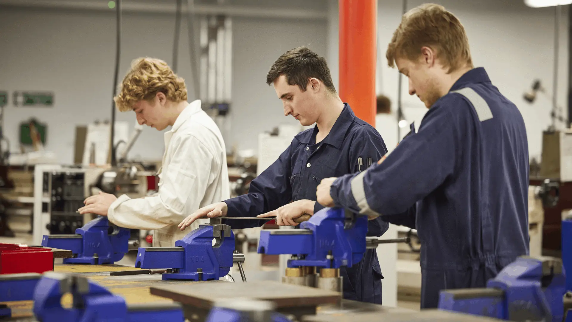 Students at a workbench in the marine engineering workshop