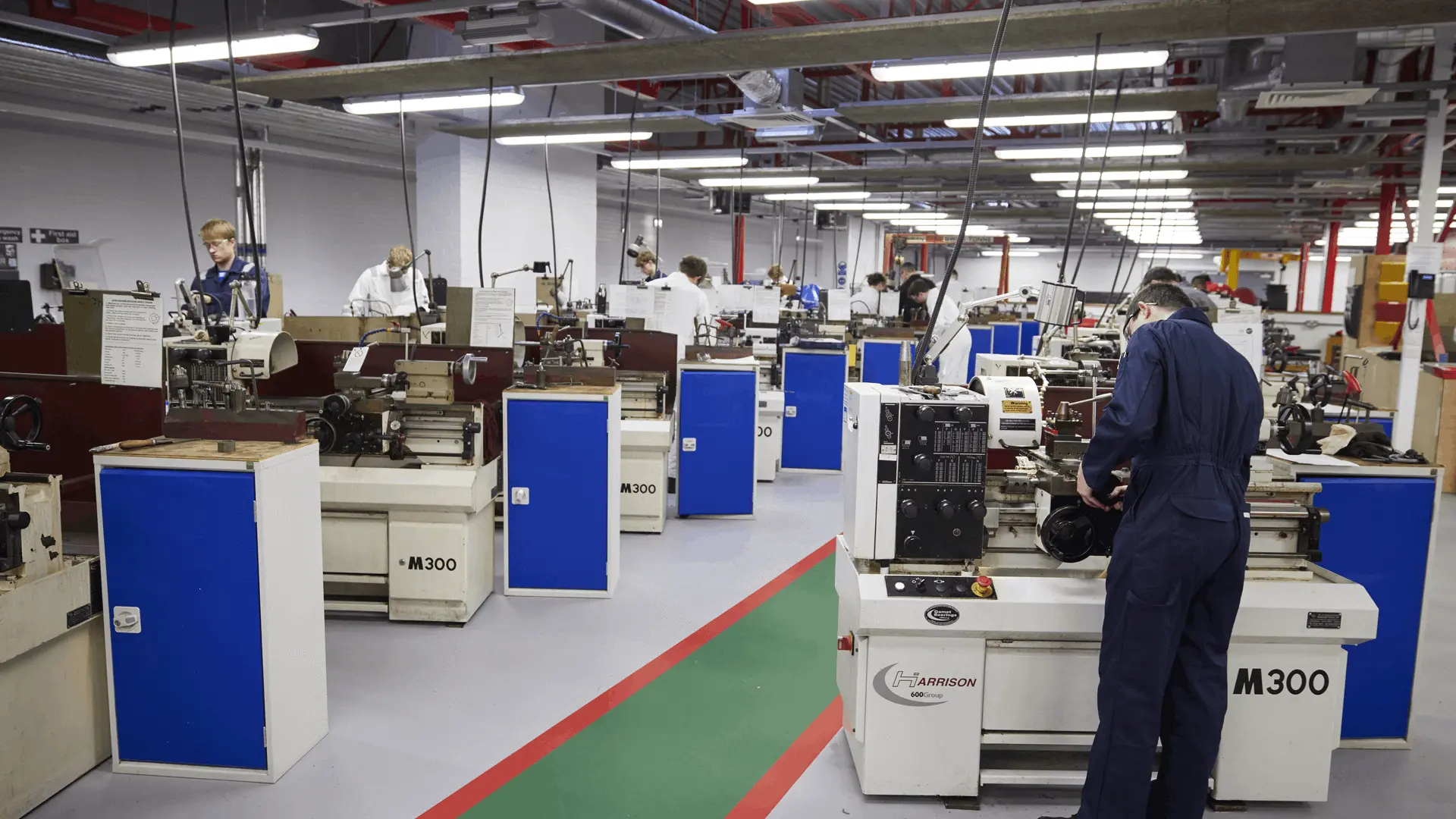 Students at workstations in the marine engineering workshop