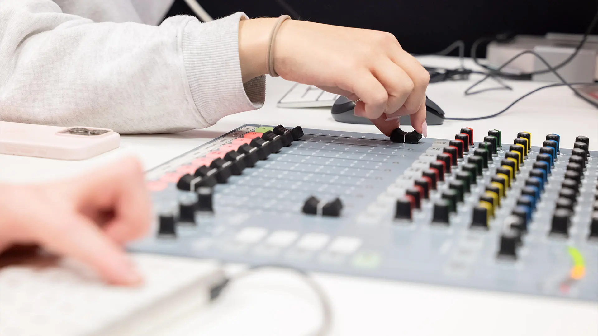 Students working in radio studio