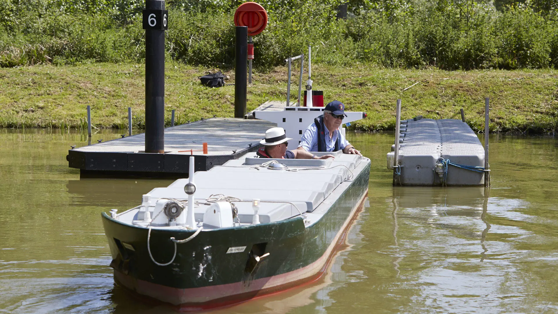 Manned model mooring alongside a jetty