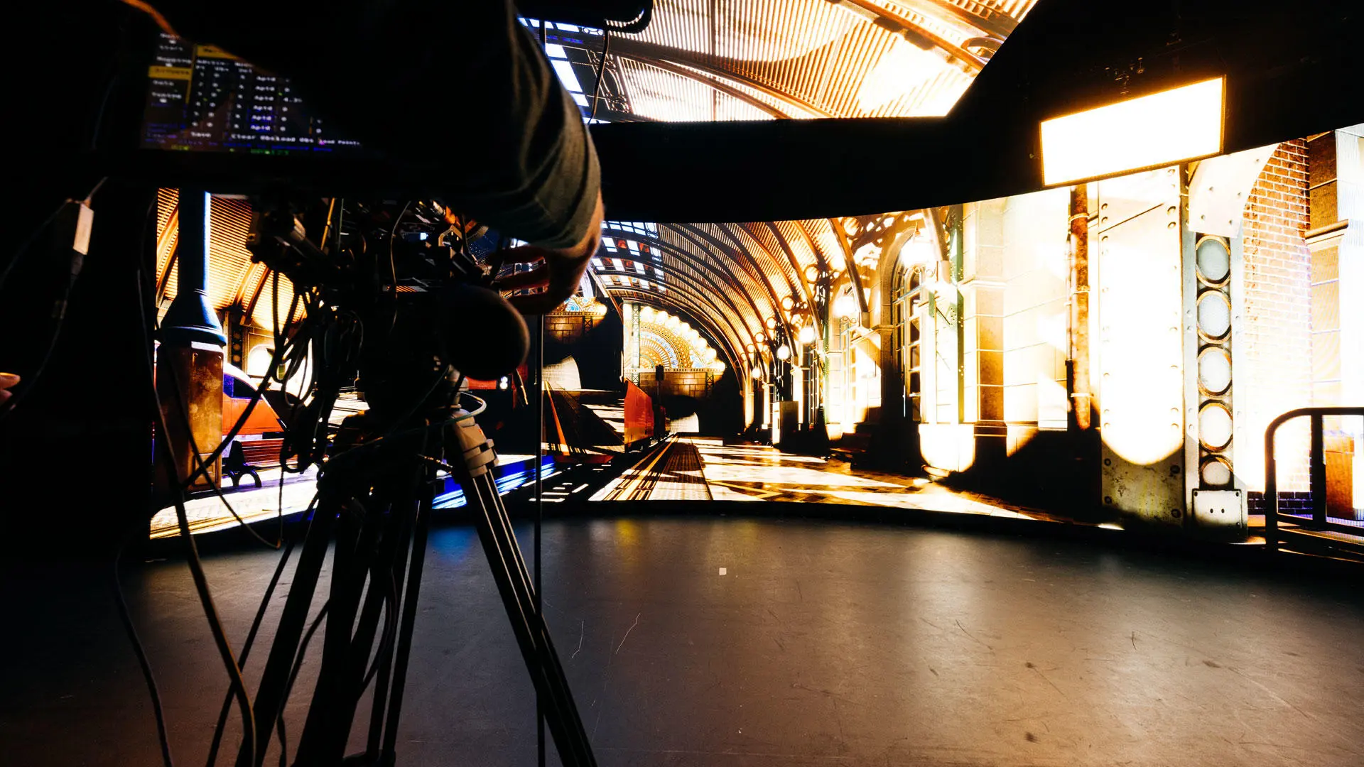 The virtual production stage with a camera in the foreground