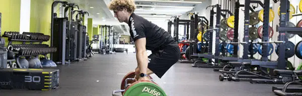 Two student athletes in the training gym