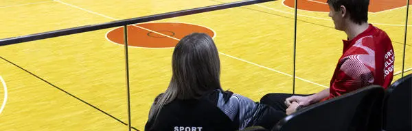 Two student athletes in the training gym
