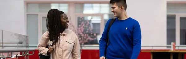 Two students talking to each other