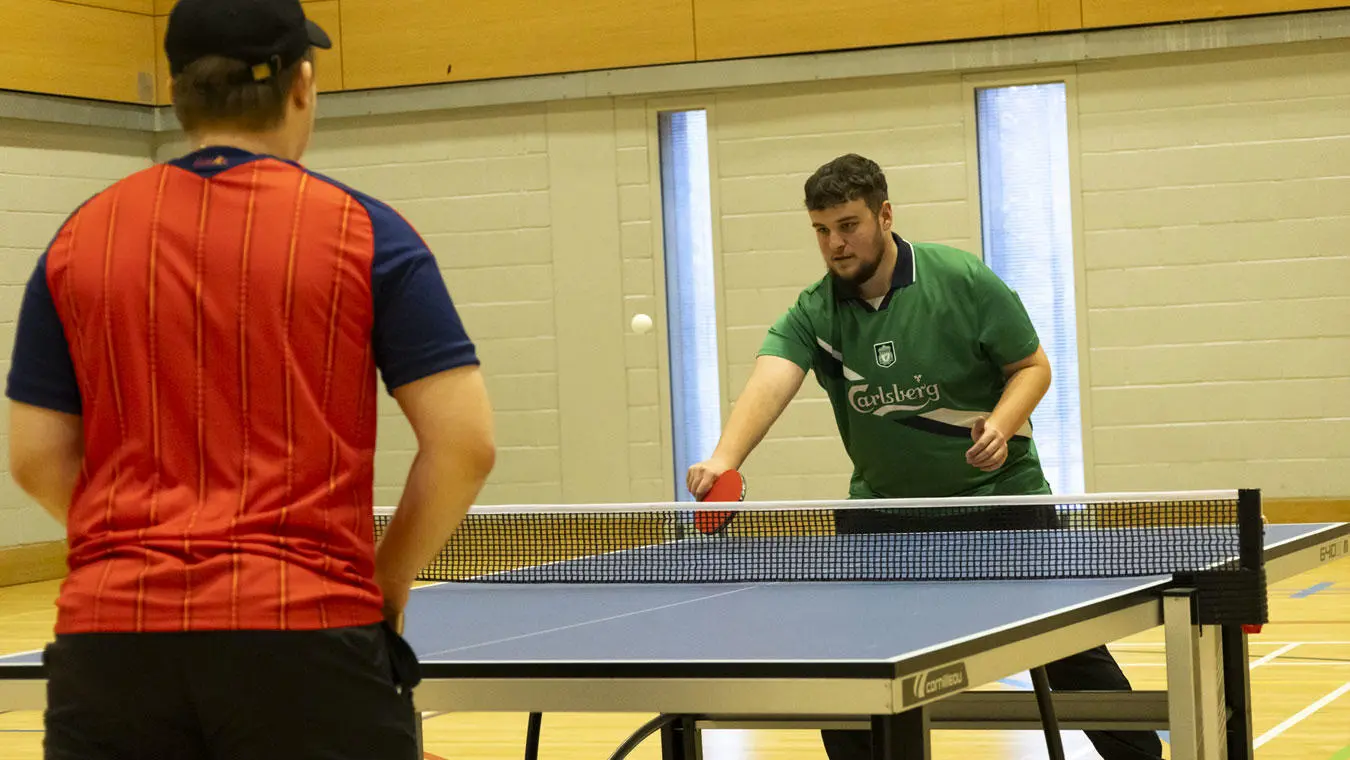 Students playing table tennis