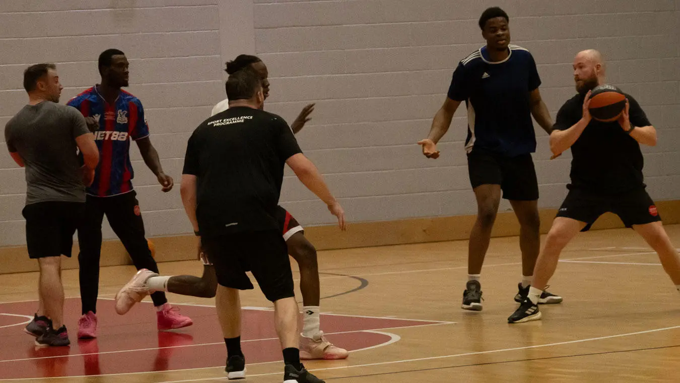 Students playing basketball