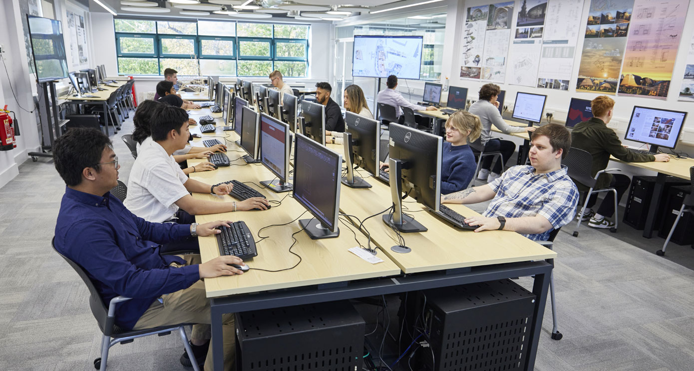 Students sitting at computers in the architecture studio
