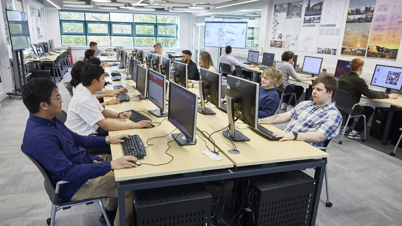 Students sitting at computers in the architecture studio