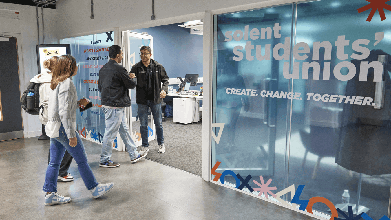 Students walking into the students' union office